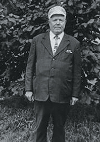 Комогорцев - -